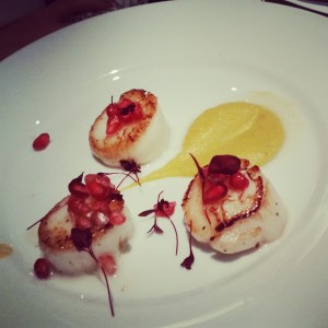 A starter of pan seared scallops